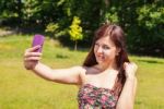 Young Girl Making Selfie In A Park Stock Photo