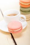 Colorful Macaroons With Espresso Coffee Stock Photo