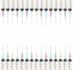 Five Color Medical Syringe Background On Top And Bottom View Stock Photo