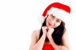 Young Girl Wearing Christmas Hat Stock Photo