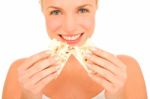 Woman Eating Crackers Stock Photo