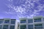 Facade Of Modern Low Rise Architecture In Blue Sky Stock Photo