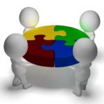 Puzzle Solved And 3d Characters Showing Union And Cooperation Stock Photo