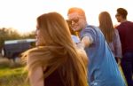 Portrait Of Group Of Friends Having Fun In Field Stock Photo