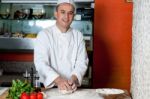 Chef Preparing Pizza Base Stock Photo