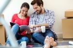 Young Couple Moving In New Home Stock Photo