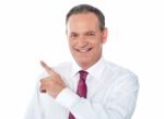 Businessman Pointing backward Stock Photo