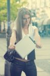 Young Business Woman With Tablet Computer Walking On Urban Stree Stock Photo