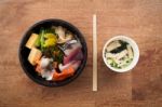 Japanese Food Tekka Don Take Away On Wooden Background Stock Photo