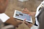 Hands Of A Casual Woman Holding A Digital Tablet Stock Photo