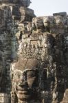 Ancient Stone Faces Of King Jayavarman Vii At The Bayon Temple, Stock Photo