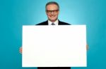 Business Representative Holding Blank Ad Board Stock Photo