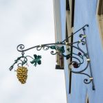 Golden Grapes Hanging Sign In Rothenburg Stock Photo