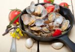 Fresh Clams On An Iron Skillet Stock Photo