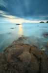 Seascape Sunsset With Fantastic Rock Surface Stock Photo