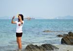 Funny Young Woman On Beach Stock Photo