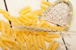 Italian Pasta Penne With Wheat Stock Photo