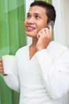 Man Talking Over Phone Stock Photo