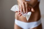 Young Woman Clean Hands With Wet Wipes Stock Photo