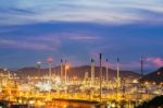 Oil Refinery Against Beautiful Sunset Stock Photo