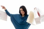 Portrait Of Cheerful Model With Carry Bags Stock Photo