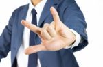 Businessman With I Love You Sign Hand Gesture Stock Photo