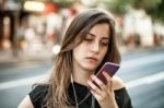 Woman On The Phone In The Street Stock Photo