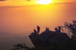 Young Man  Asia Tourist  At Mountain Is Watching Over The Misty Stock Photo