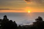 Colorful Sunrise Above The Clouds Stock Photo