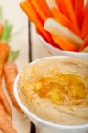 Fresh Hummus Dip With Raw Carrot And Celery Stock Photo