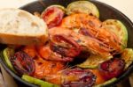 Roasted Shrimps With Zucchini And Tomatoes Stock Photo