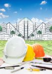 Architect Working Table With Writiing Tool  Safety Helmet And Pe Stock Photo