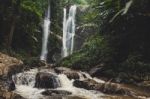 Beautiful Waterfall In Green Forest In Jungle Stock Photo