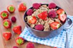 Bran Flakes With Fresh Raspberries And Strawberries Stock Photo