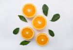 Fresh Orange Citrus Fruit On Wooden White Background. Top View Stock Photo