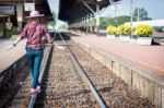 Tourists Woman Are Enjoying The Train Station Stock Photo