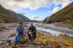 Couples Of Asian Traveler Taking A Photograph In Franz Josef Glacier Important Traveling Destination In South Island New Zealand Stock Photo