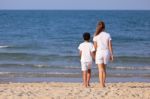 Asian Family On Beach Stock Photo