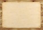 Plain Paper Board On Wood Plank Stock Photo