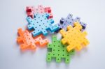 Colorful Plastic Jigsaw Puzzle Game Stock Photo