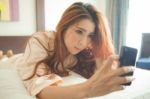 Woman Using Smart Phone Stock Photo