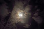 Full Moon Shining Glowing Light Through The Darkness Of Cloudy N Stock Photo