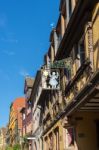 Hanging Sign In Riquewihr In Haut-rhin Alsace France Stock Photo