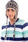 Portrait Of Young Boy Covering His Head With Woolen Cap Stock Photo