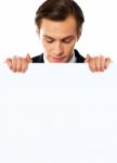 Young Male Holding Blank Board Stock Photo