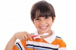 Closeup Of Cute Kid Brushing His Teeth Stock Photo