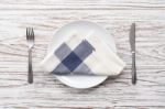 Empty Plate Napkin Fork Knife Silverware White Wooden Table Background Stock Photo