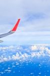 Sky And Clouds. View From The Window Of An Airplane Flying In Th Stock Photo