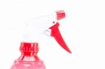 Red Bottle Spray On White Background Stock Photo