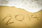 2014 Text Written On The Beach Stock Photo